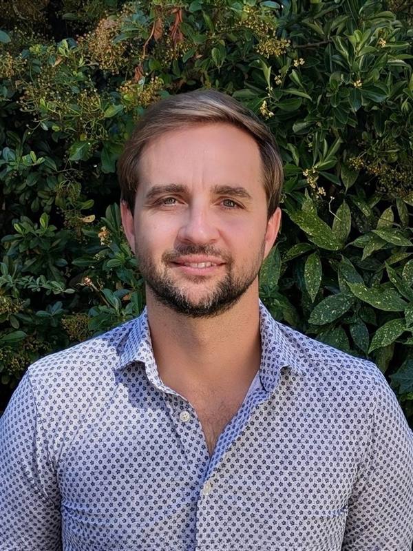 Portrait of Luke Reynolds, Senior AI Product Manager